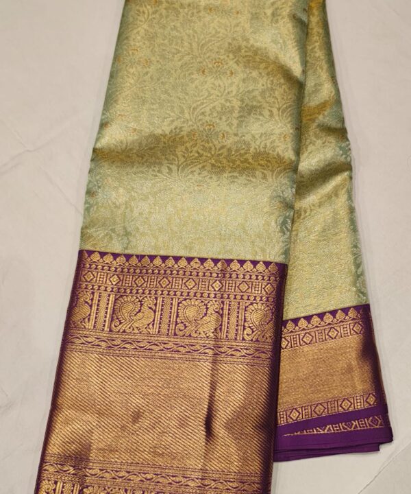 Pastel Green and Purple Kanchipuram Silk Saree with Rich Golden Zari Peacock Border