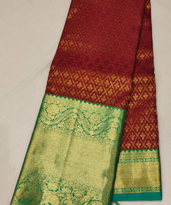 Maroon Kanchee Silk Saree with Emerald Green Zari Border and Rich Temple Weave.