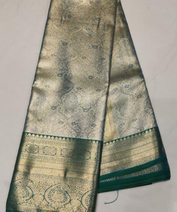 Elegant Silver Green  Silk Saree with Intricate Zari Weaving and Paisley Border