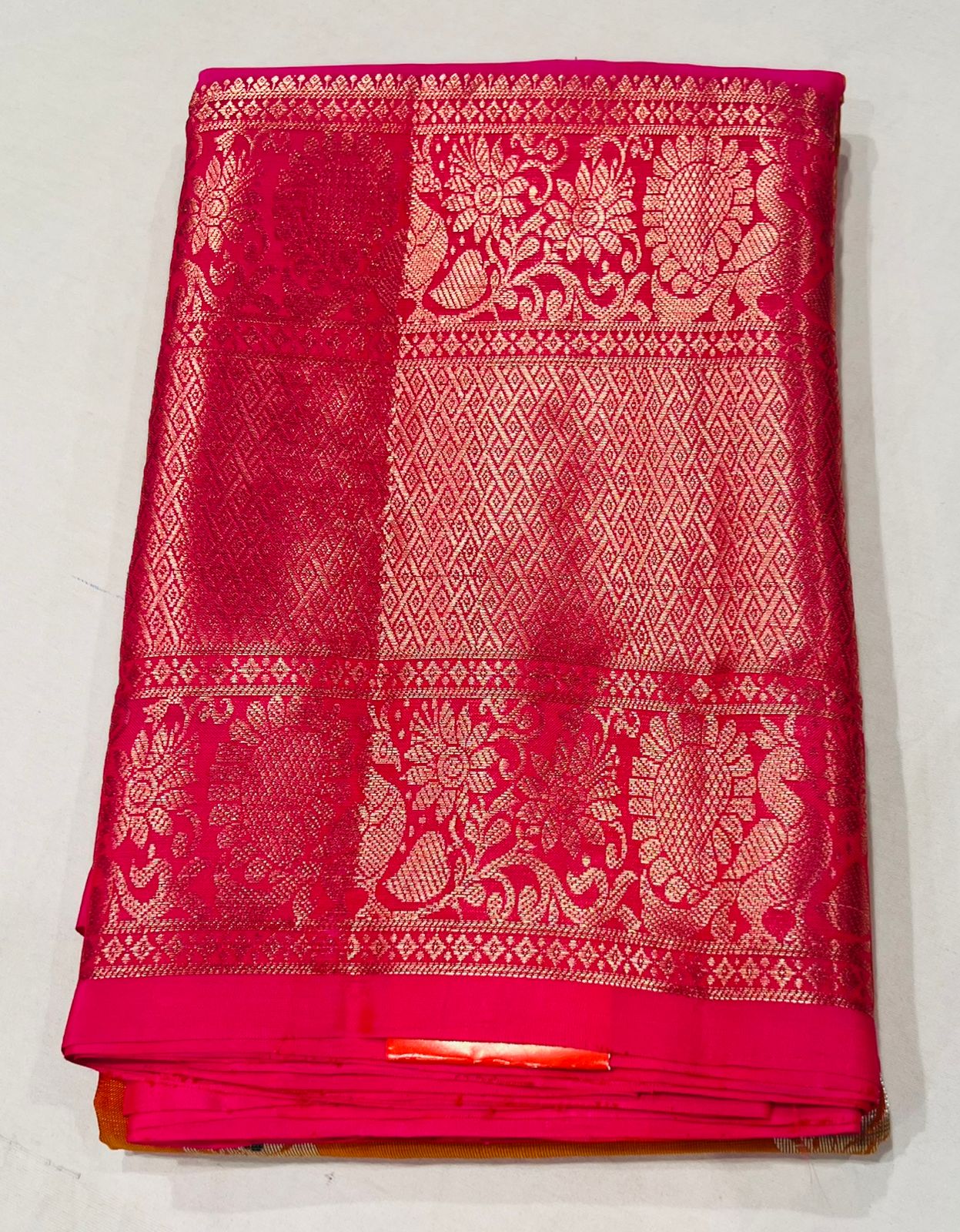 Orange and Pink Kanjivaram Saree with Gold and Silver Zari Work